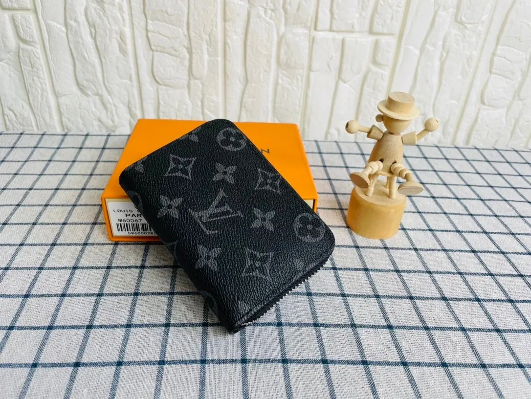 LV COIN PURSE - Image 1